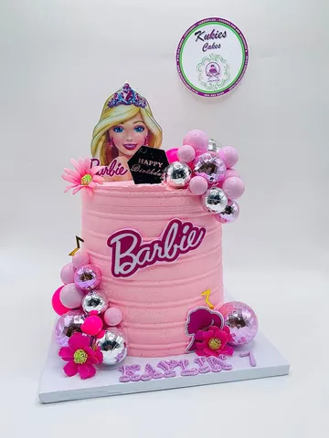 Pink Barbie themed birthday cake with disco ball spheres