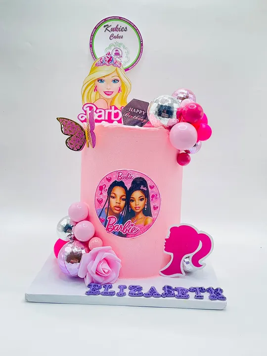 Pink Barbie themed birthday cake with disco-ball spheres