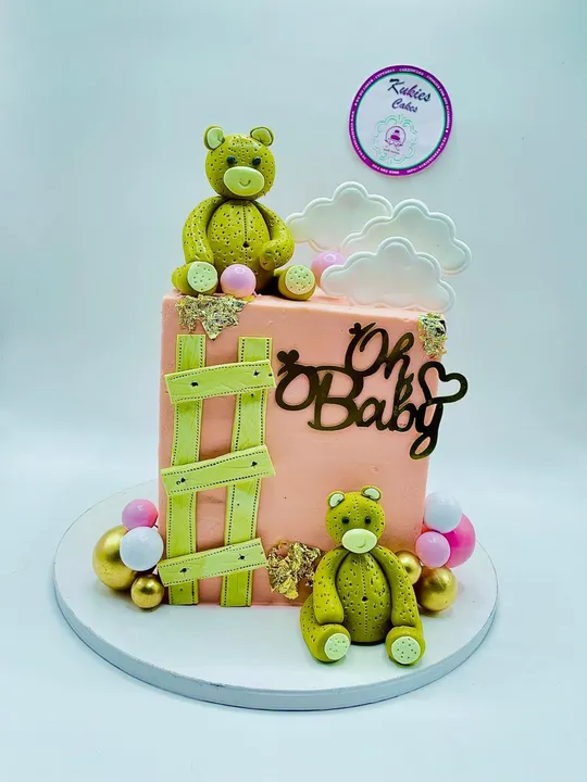 Cream square baby shower cake with fondant teddy bears and a gold Oh Baby topper
