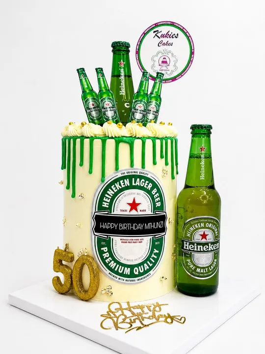 Cake wrapped in a Heineken beer label print with fondant bottles for a 50th birthday