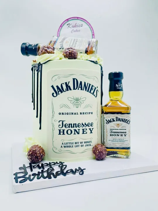 Cake printed as a Jack Daniel's Tennessee Honey label with a chocolate drip