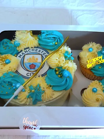 Manchester City FC themed bento cake with matching sky-blue and gold cupcakes