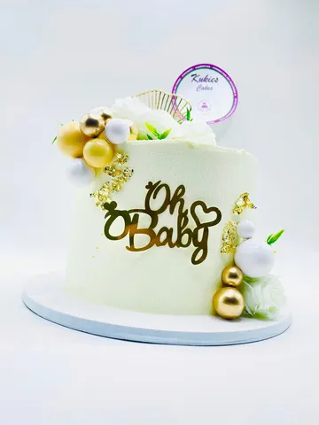 Pale cream Oh Baby cake with white roses and gold leaf