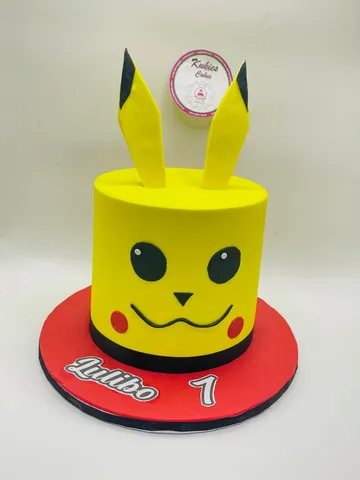 Yellow Pikachu face novelty cake with pointed ears