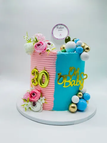 Pink and blue split cake for a 30th birthday and gender reveal