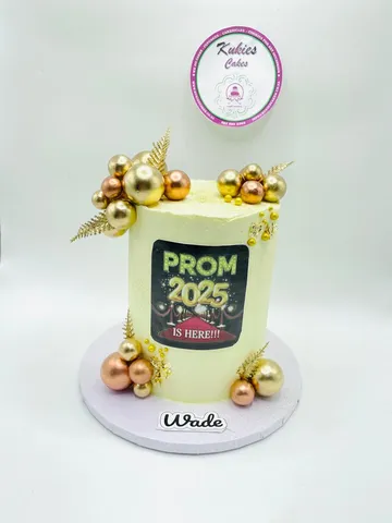 Pale cake with gold sphere clusters and a Prom 2025 print