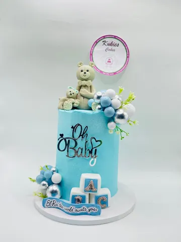 Teal Oh Baby cake with a fondant mama and baby teddy bear topper