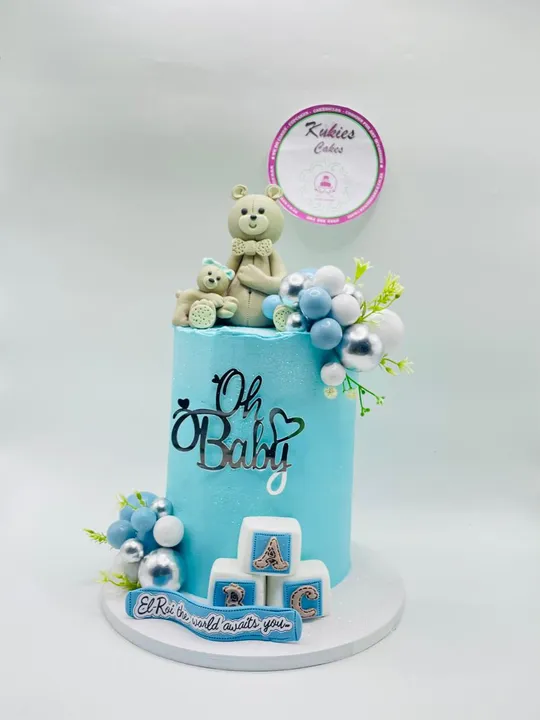 Teal Oh Baby cake with a fondant mama and baby teddy bear topper