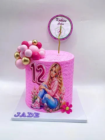 Pink textured cake with a printed teen fashion illustration