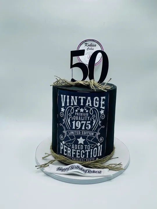 Black cake printed as a vintage whiskey label for a milestone birthday