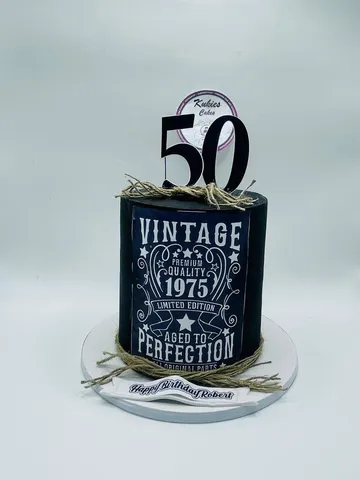 Black cake printed as a vintage whiskey label for a milestone birthday